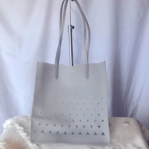 EDDIE BORGO for NEIMAN MARCUS Laser Cut Jelly light gray cosmetic tote. - Picture 2 of 8